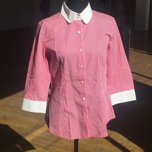 Red and white checker-print button-down shirt.